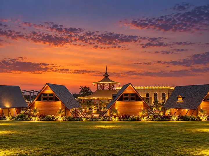 A-frame cottages with the pagoda and palace hall at sunset